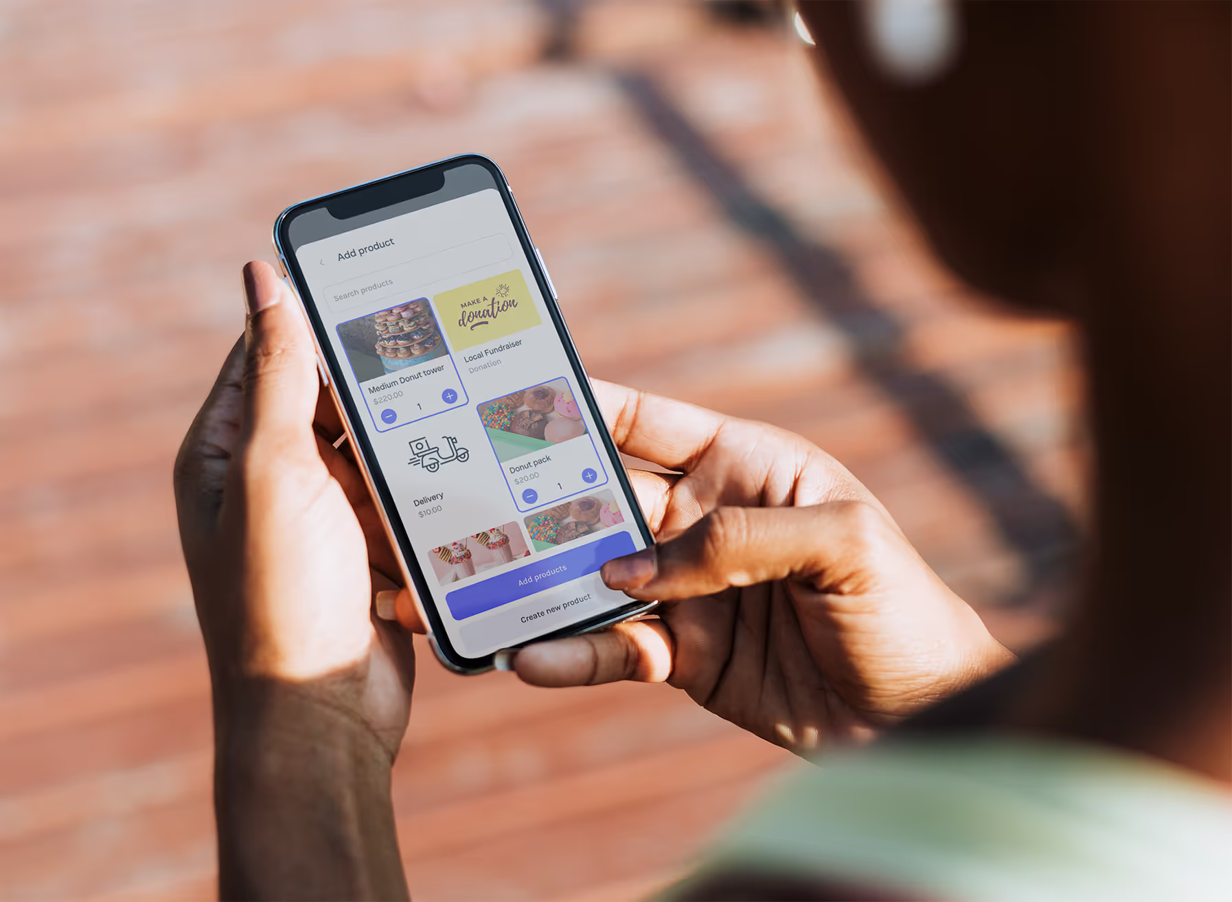 pebl-holding-phone-POS