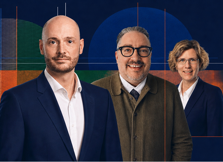 Three people stand side by side against an abstract blue background with orange and green accents, all wearing formal clothes and looking at the camera.