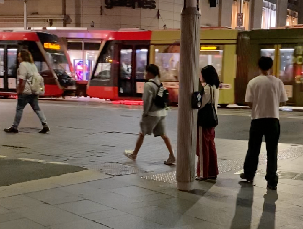 Pedestrians following others across