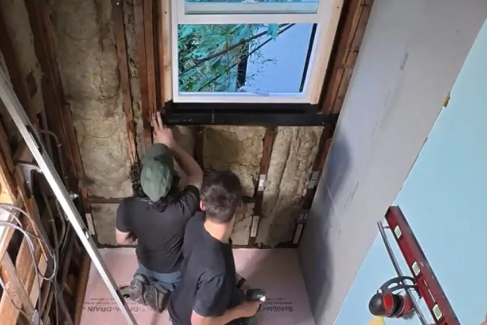 Rot found behind the bathroom window: the rough opening rebuilt and the new window flashed