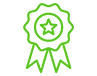 Green award ribbon badge with star, symbolizing achievement or recognition