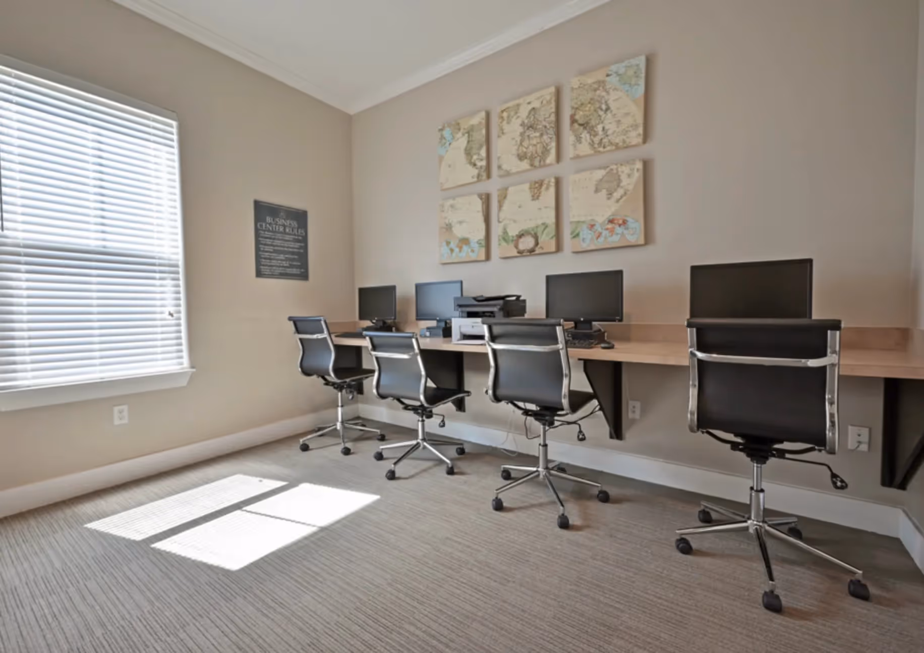 Business center with computers and desks