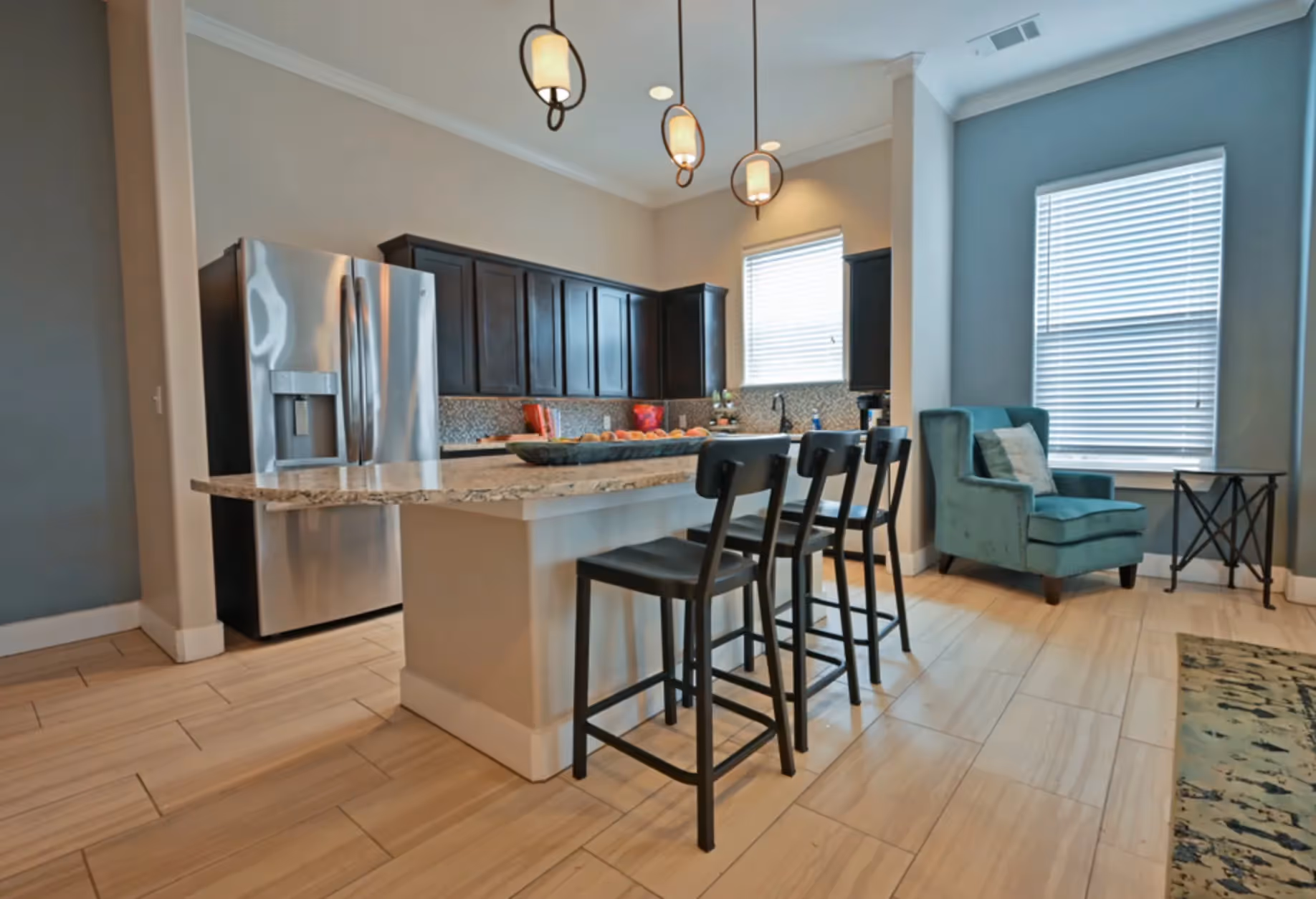 clubhouse kitchen with stainless steel fridge