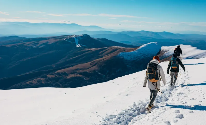 Hiking on a ridge in the snow