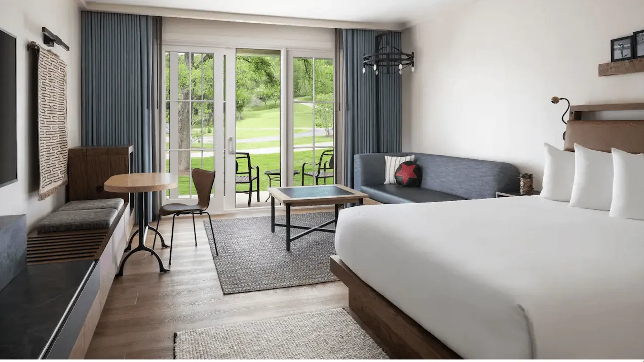 A modern guestroom of the Lost Pines Resort and Spa