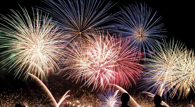 Two girls looking at stars in the sky