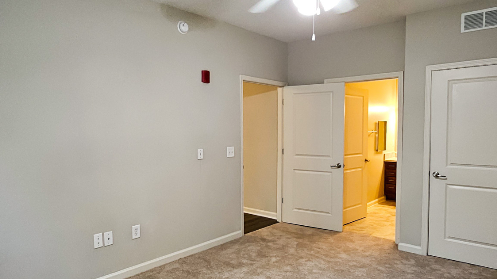 Unfurnished bedroom with carpet
