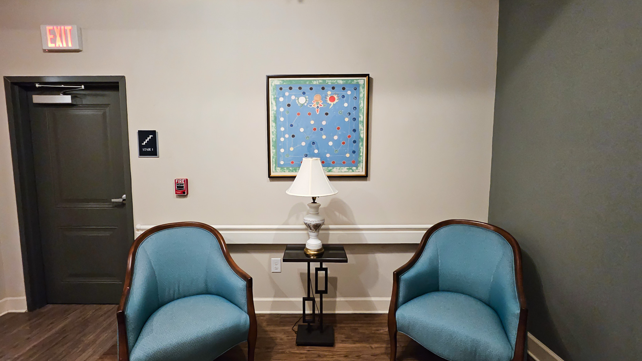 Conversation area with chairs and lamp