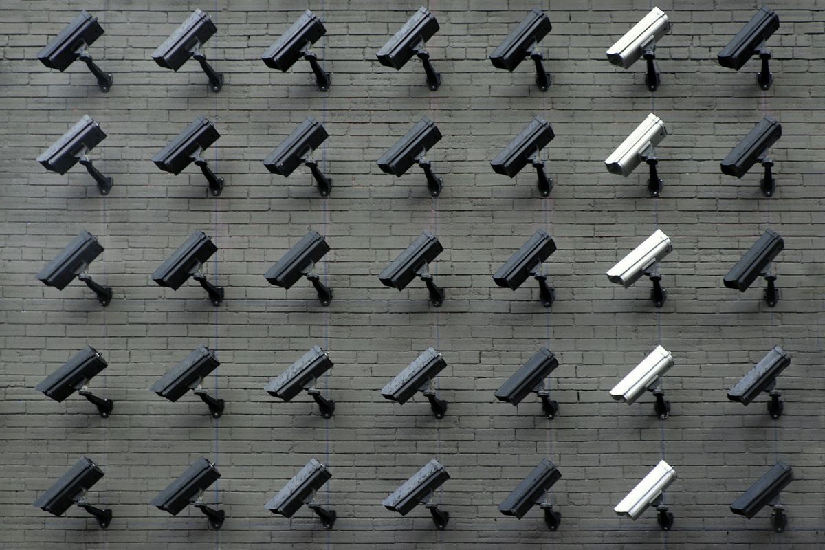 assorted-color security cameras
