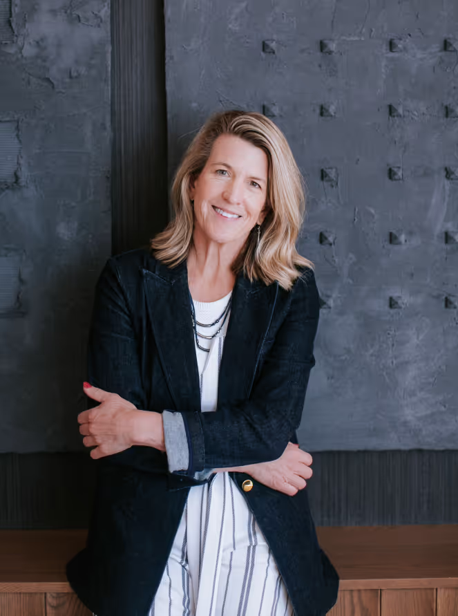 Joanna Hogan, standing with arms crossed. She is the founder and owner and brains behind the DREAMS framework