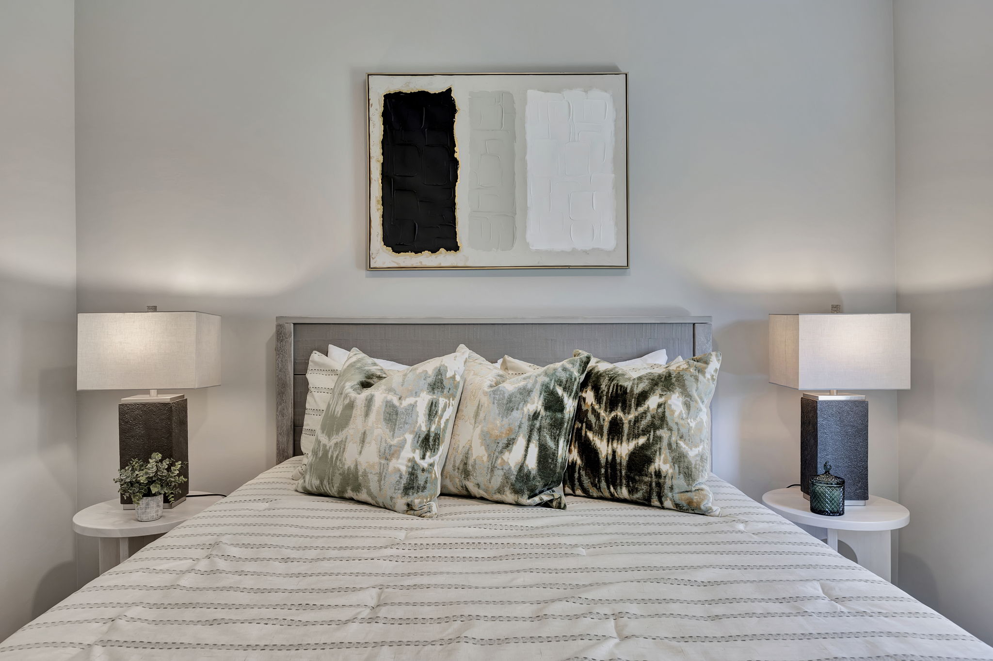 Entry vignette with woven textures and tropical greenery