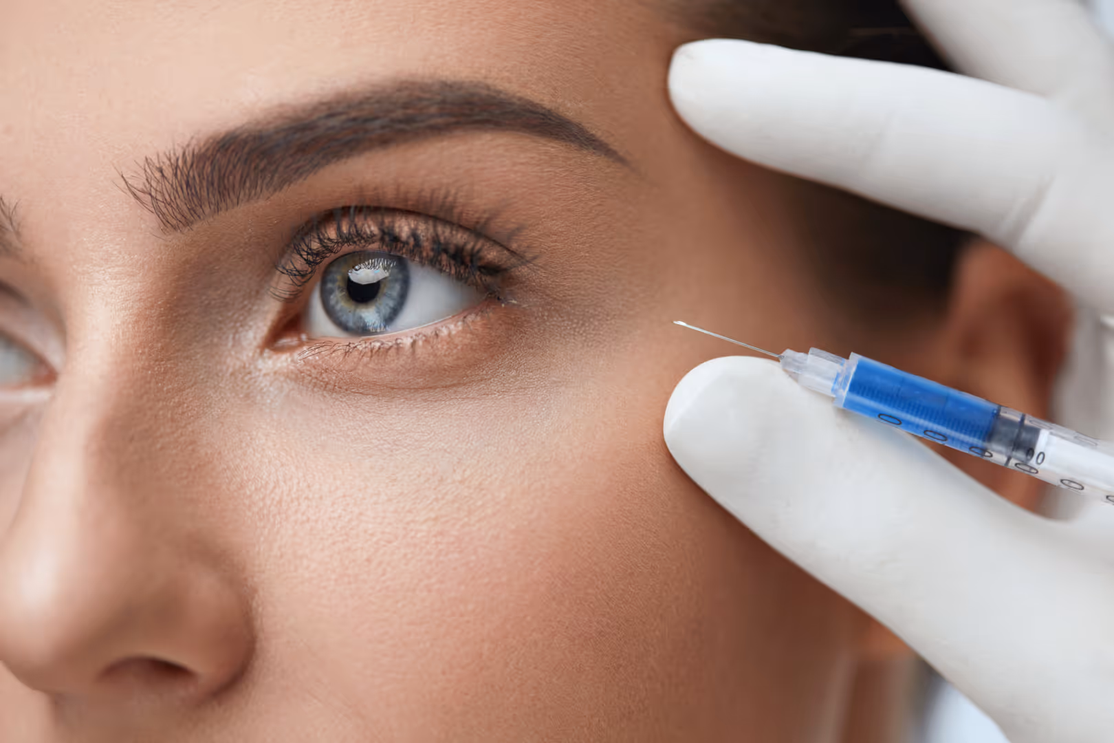 doctor consulting with patient about under eye fillers - fillers for under eye bags near me