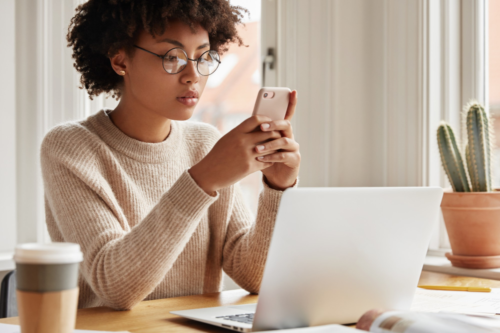 Patient researching how to choose an eyelid surgeon at home
