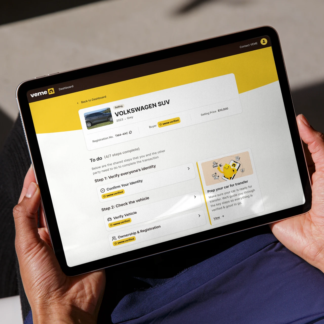 Tablet screen showing a VEME dashboard with a 2023 grey Volkswagen SUV sale listing and a to-do checklist for verifying identity, vehicle, and ownership steps.