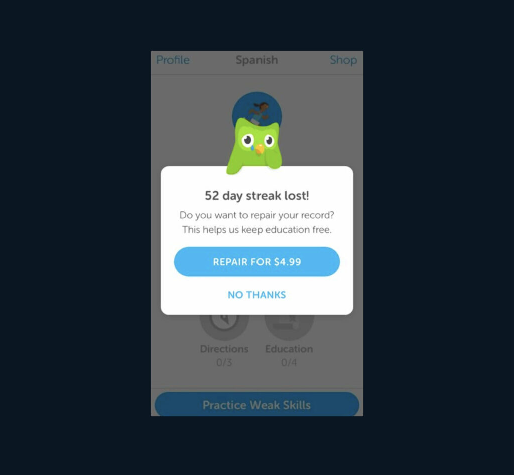 Duolingo overlay notifying user that their streak has been lost - and that they can pay $4.99 to recover it.