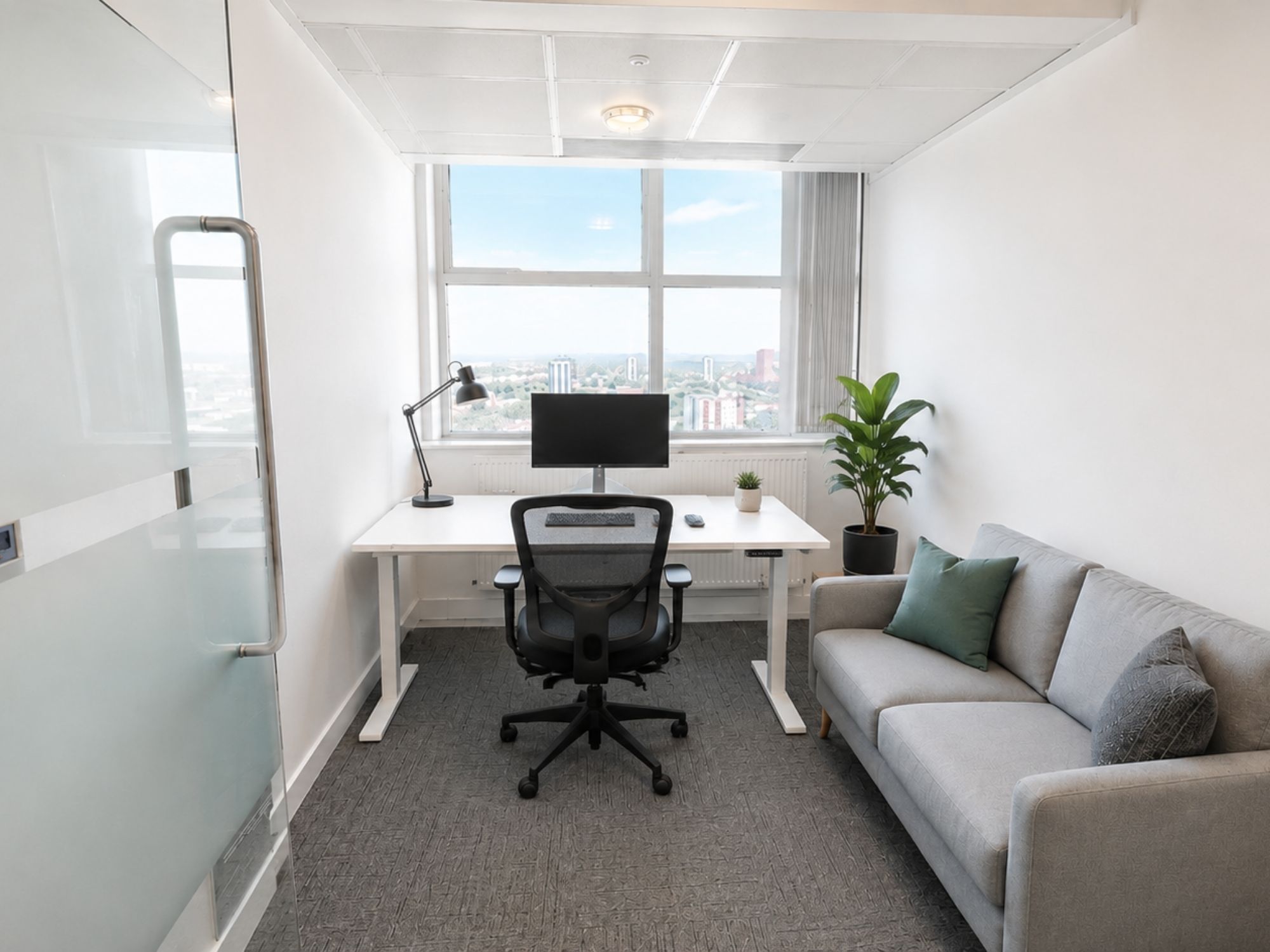 Private office suite at Cobalt Square with workstation, sofa and natural light