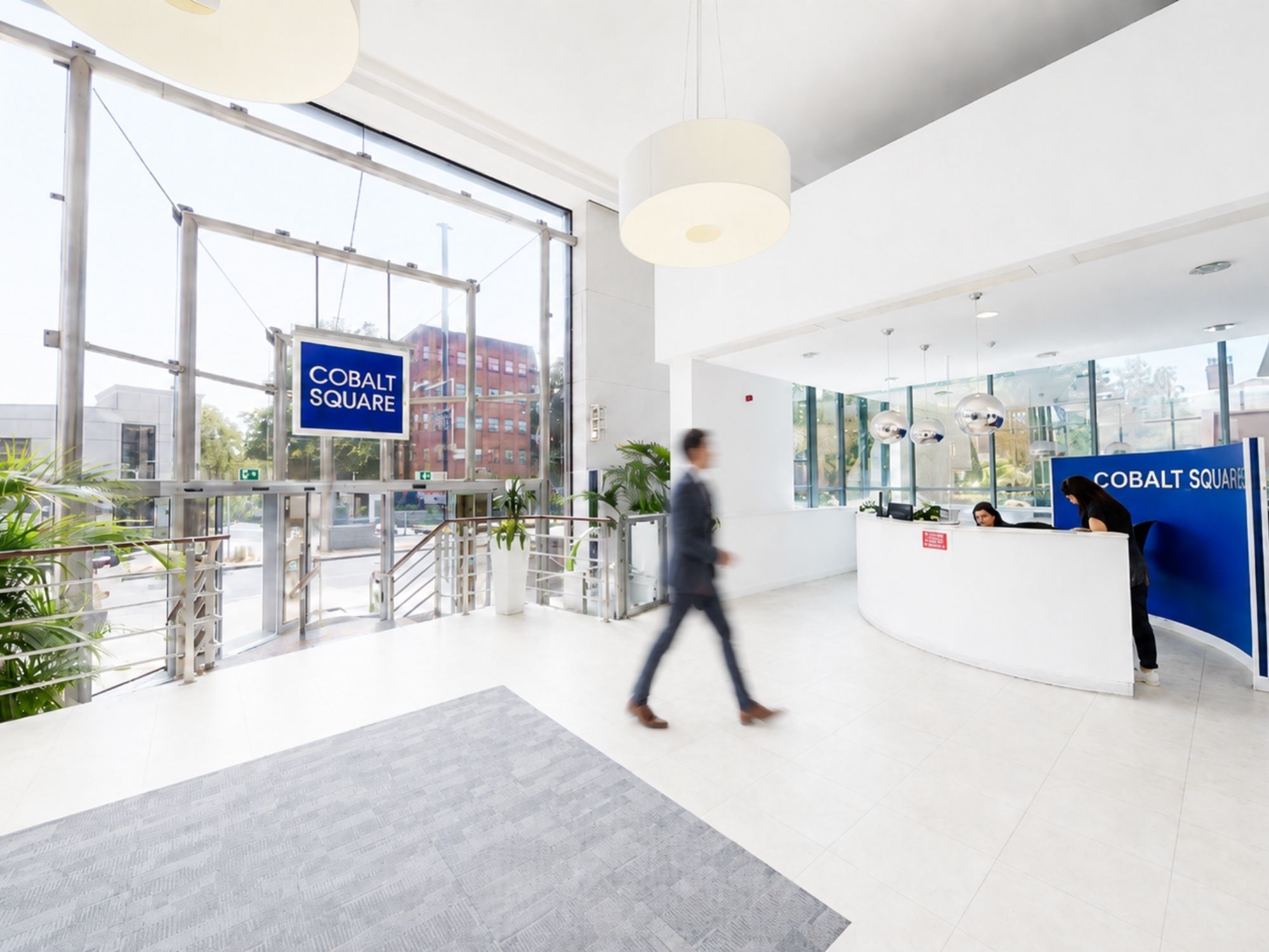 Bright reception and main entrance at Cobalt Square in Edgbaston with staffed reception desk