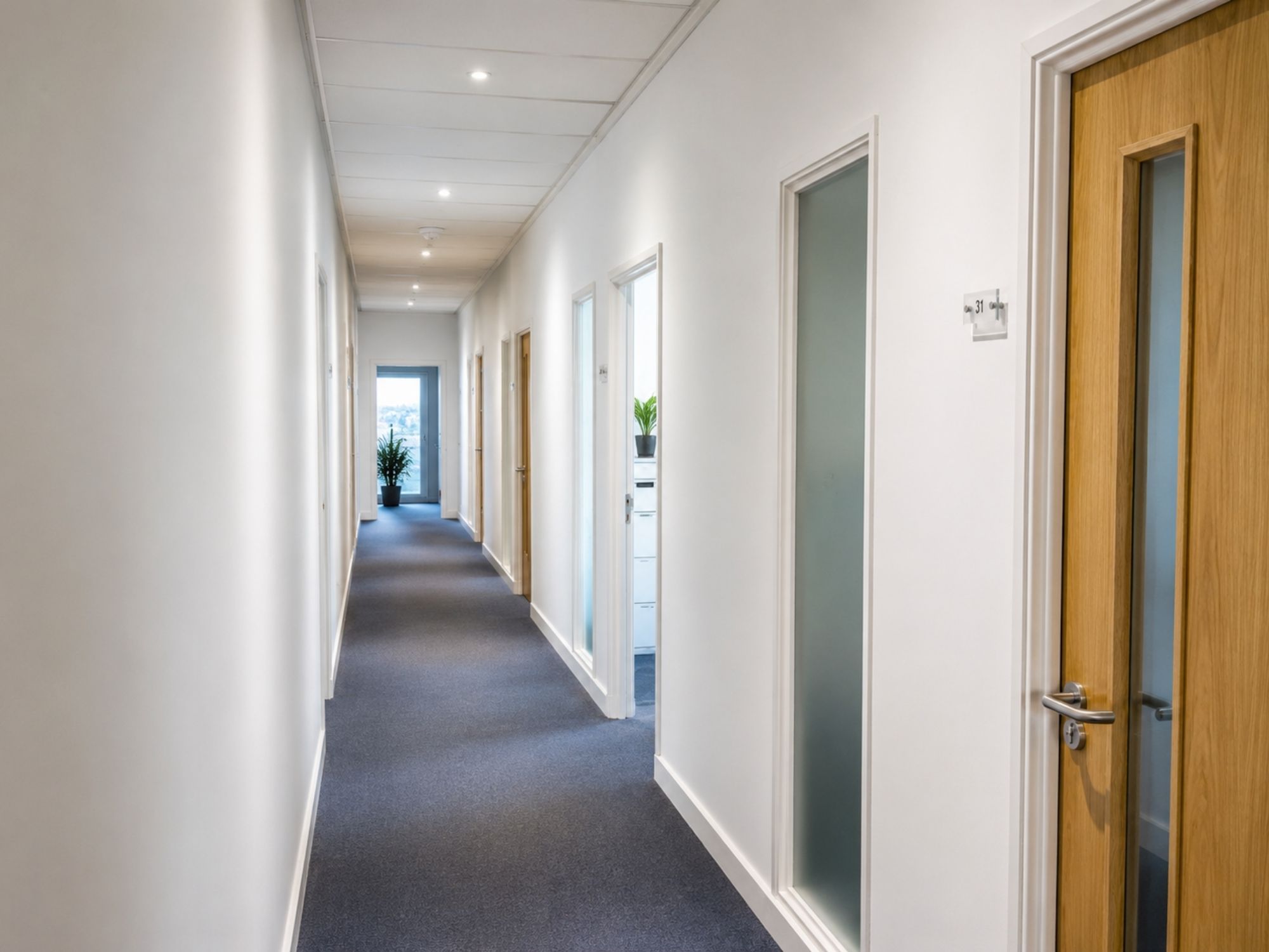 Modern office corridor connecting private serviced office suites at Cobalt Square in Edgbaston