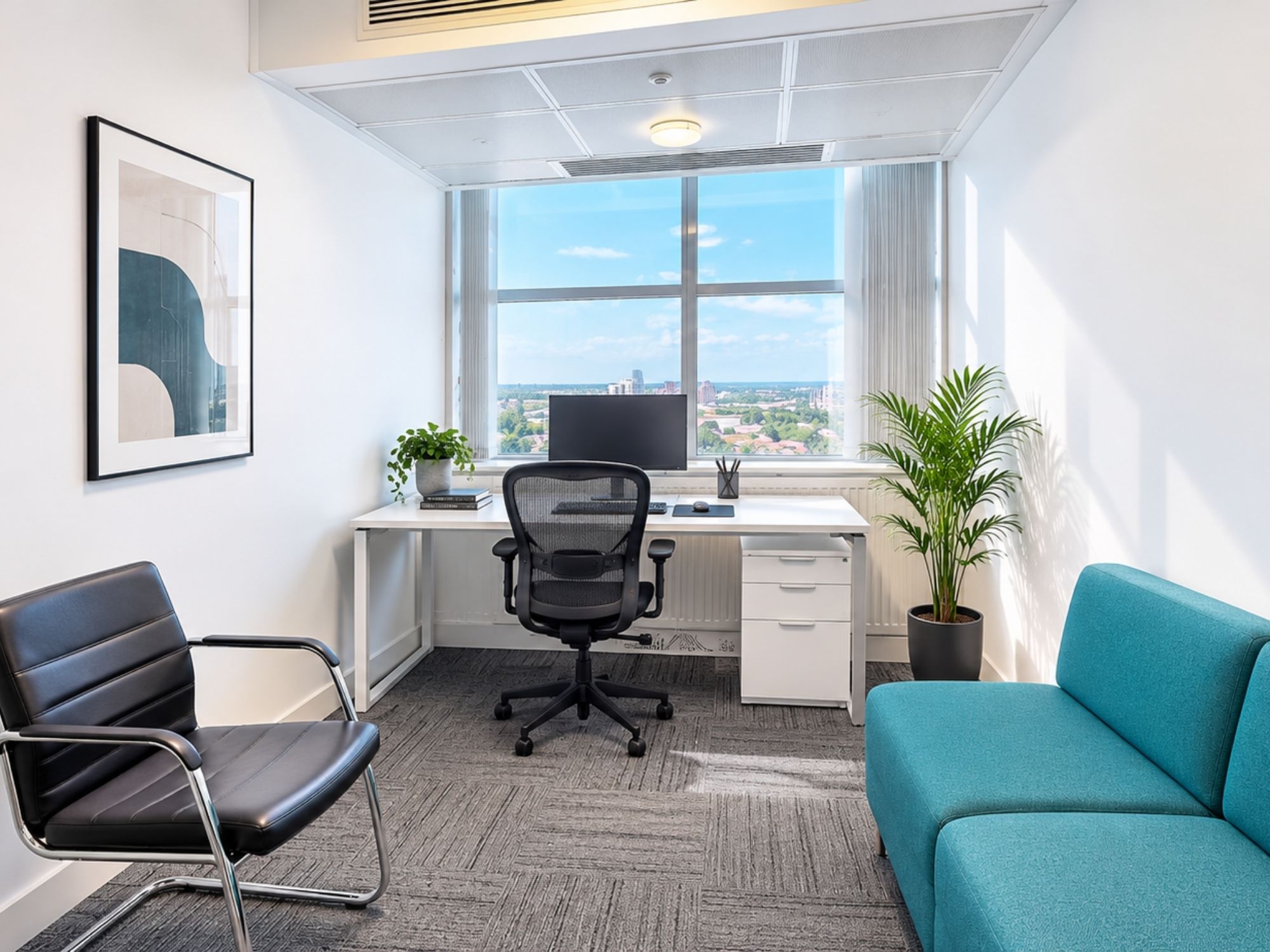 Compact furnished serviced office at Cobalt Square with desk, visitor seating and Birmingham views