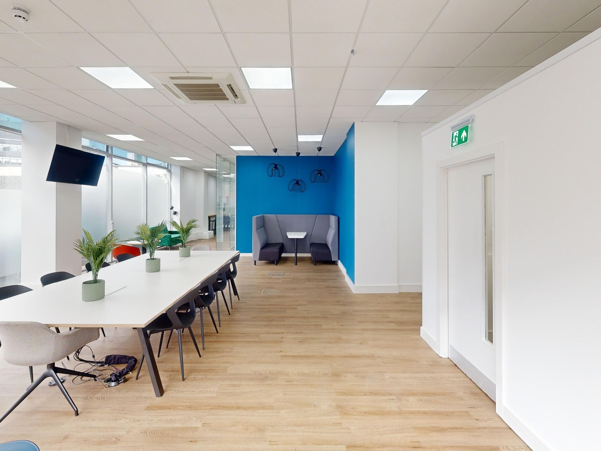 Communal breakout area and shared workspace at St James House in Sheffield