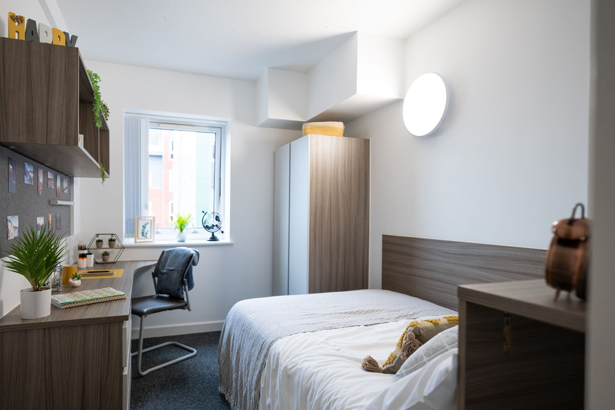Furnished student bedroom at Moor Lane Halls in Preston