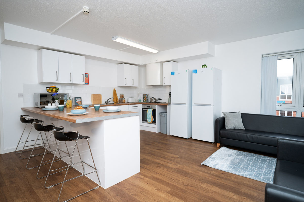 Shared kitchen and living area at Moor Lane Halls in Preston