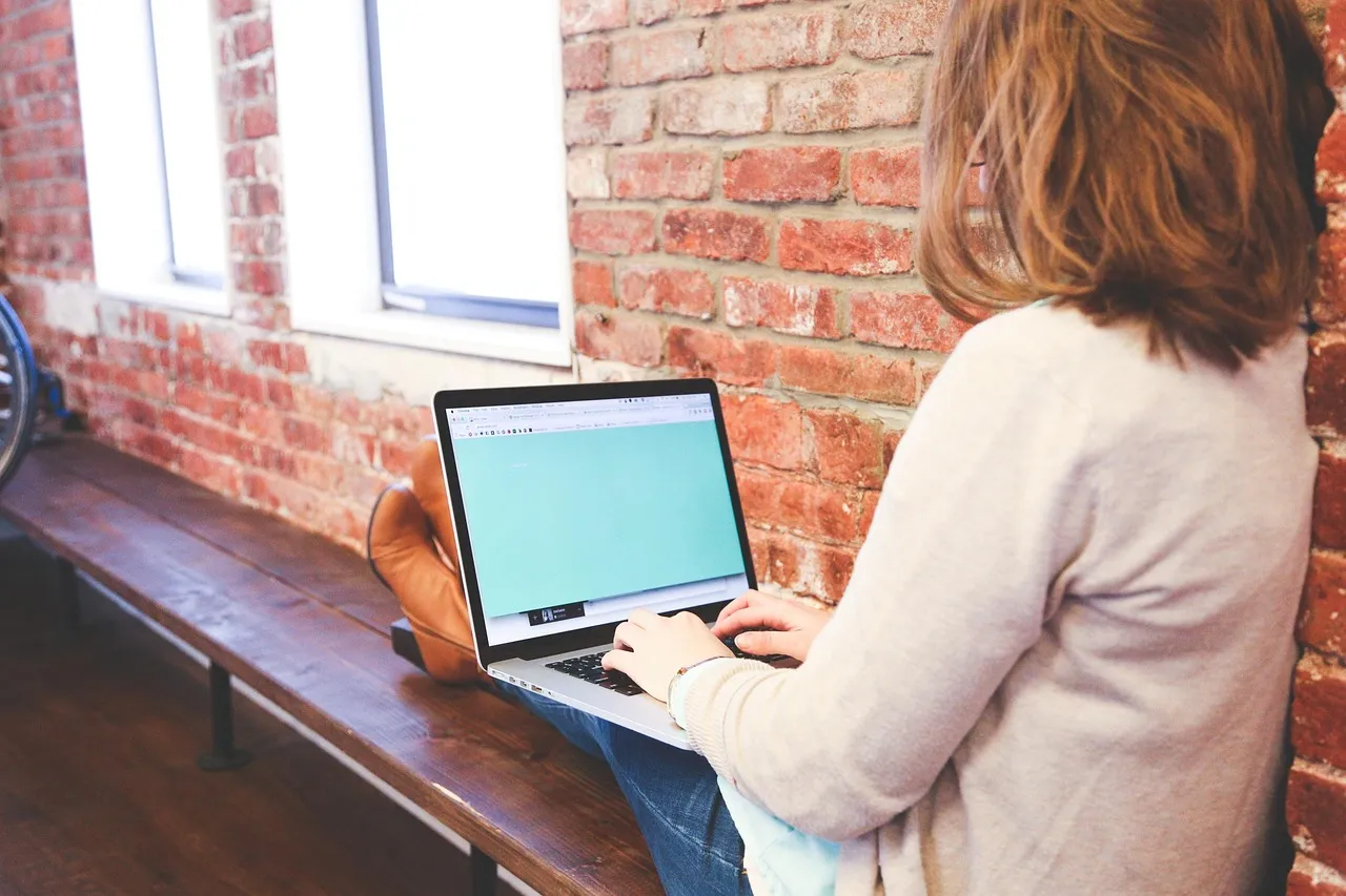 An entrepreneur communicating with her team