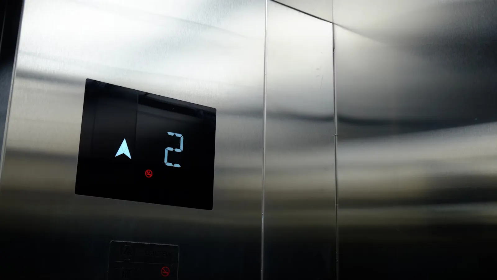 Lift interior with 2nd floor sign showing