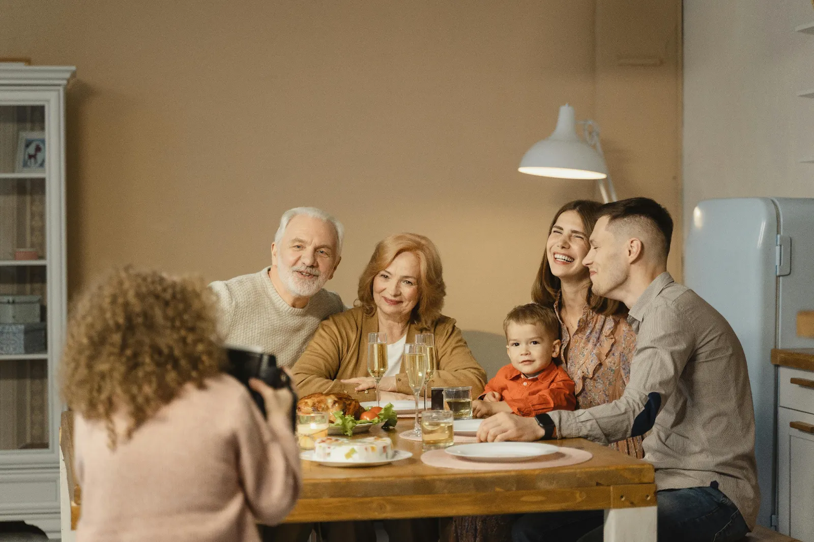 A senior couple spending time with their family