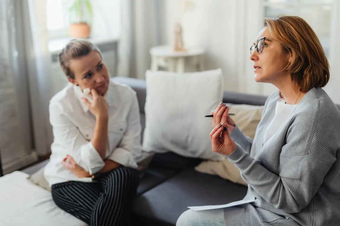 Two women in discussion