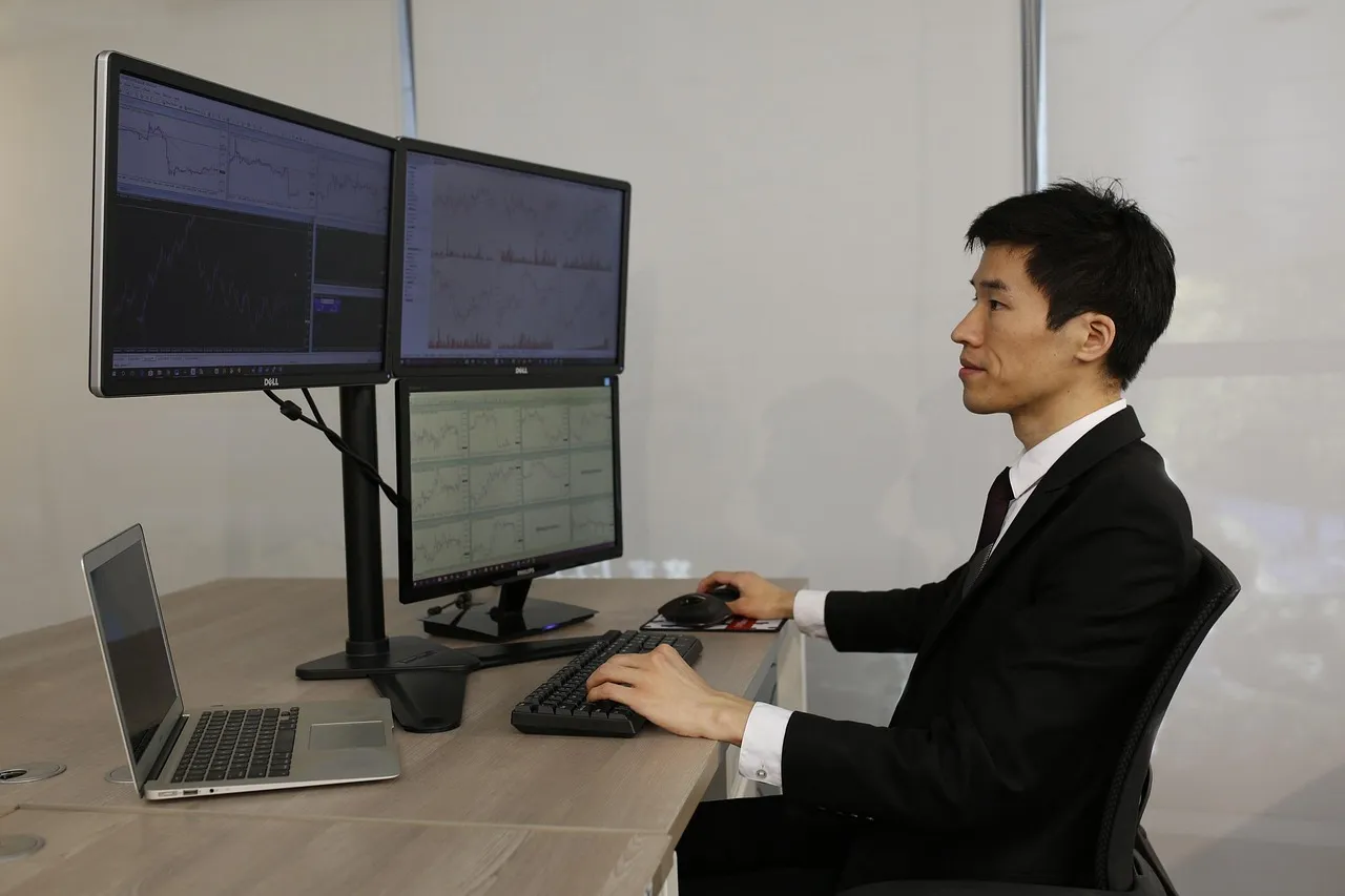 Businessman on computer with laptop