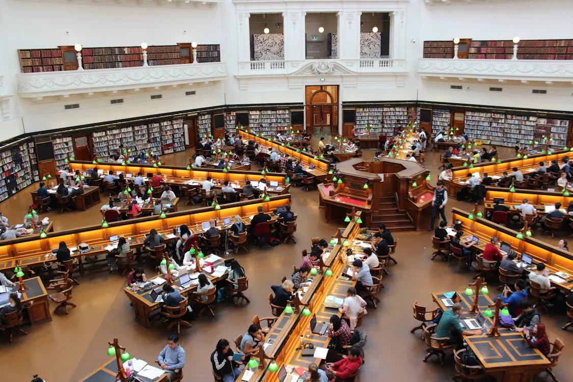 People sitting inside well lit room