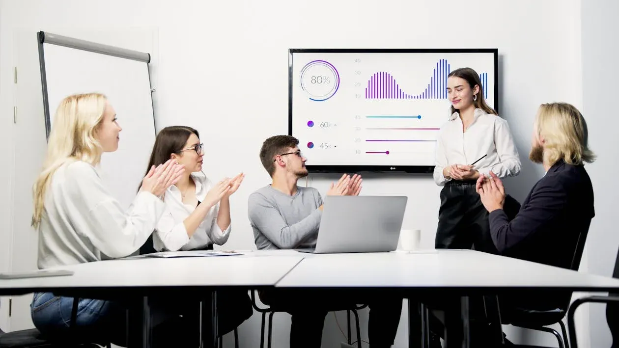 A group of people clapping