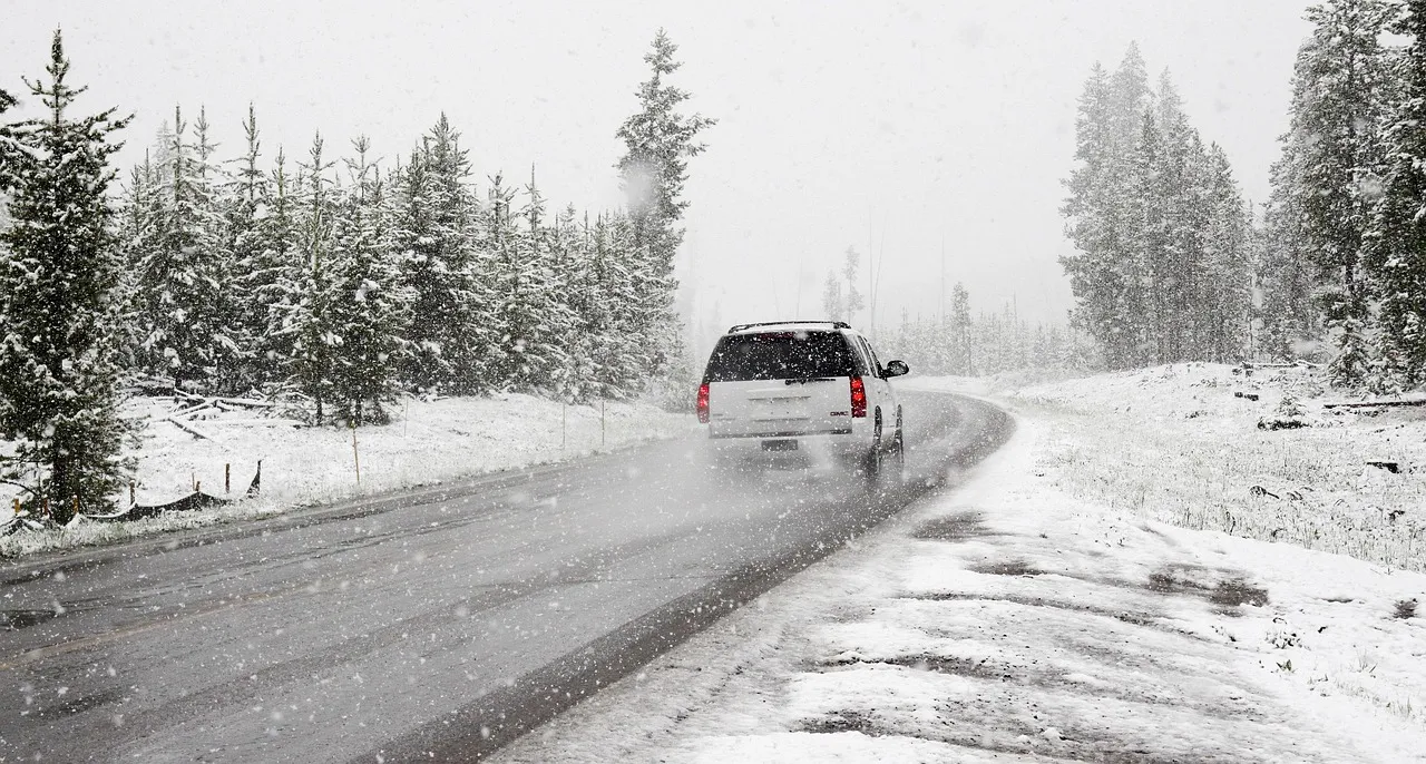 Snow road with SUV