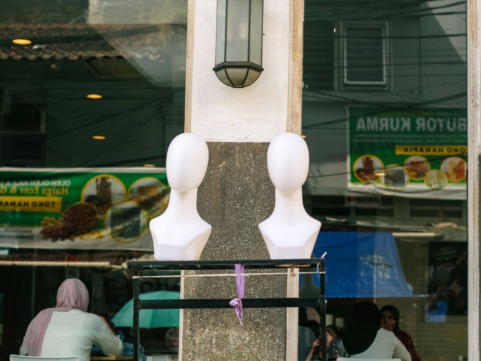Two white mannequins