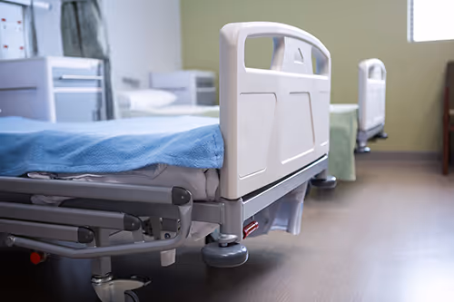 Close up of a hospital beds in a ward