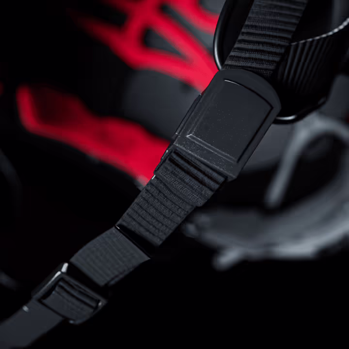 A close up of stretton fox equestrian helmet fidlock buckle