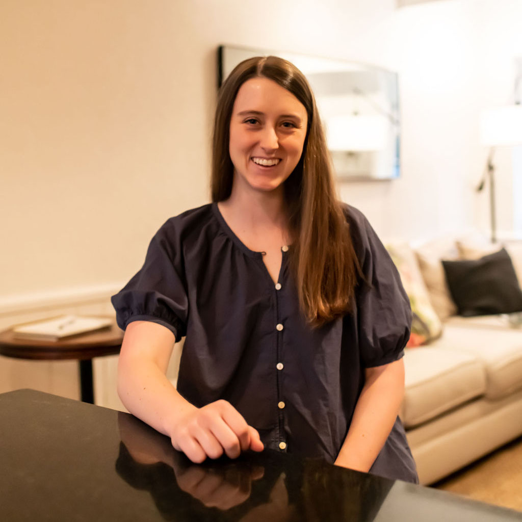 Woman smiling directly at camera
