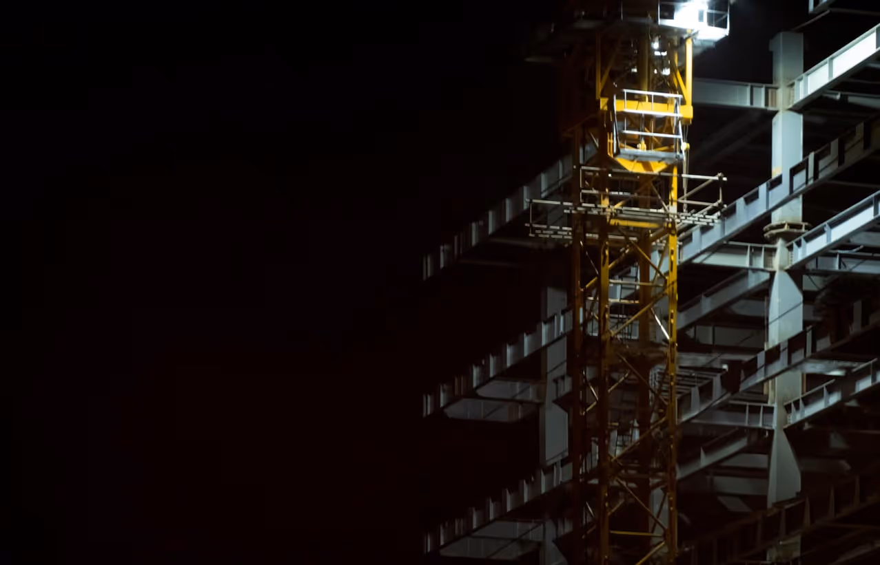 Dark construction site with a spotlight