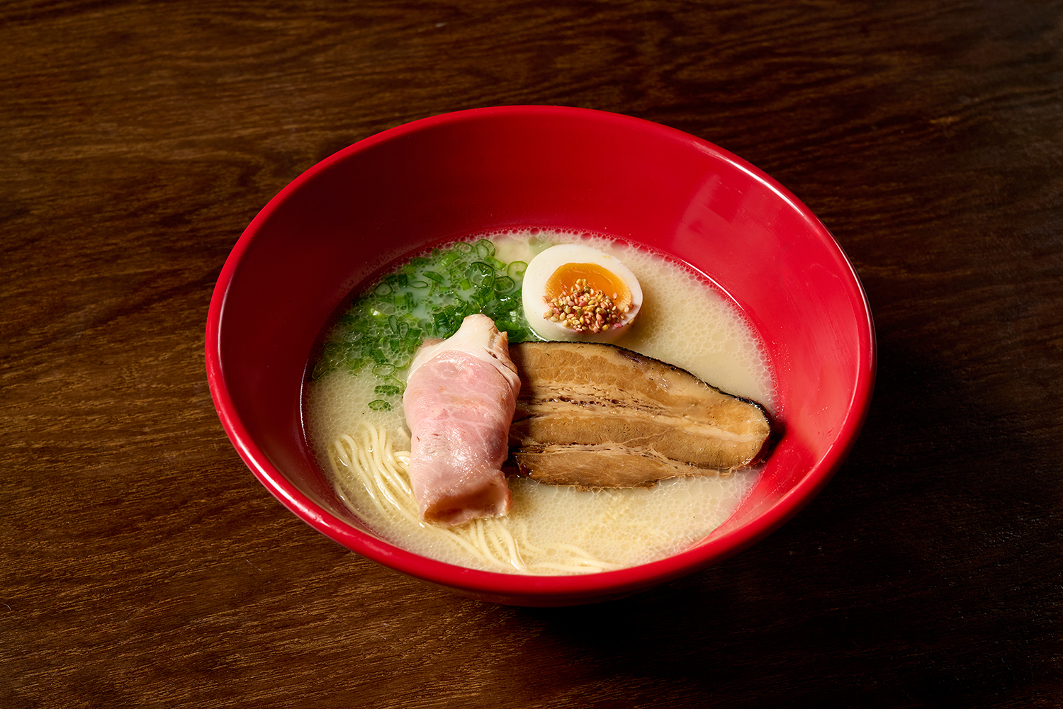 kiwami tonkotsu: a masterpiece of depth and devotion, forged in metal -revealing hidden treasures with every sip.- dashi pork, scallop, black truffle, gold leaf