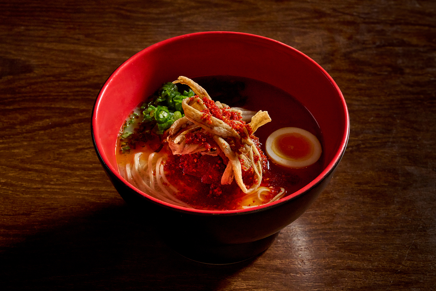 homura spicy: a rebellious kick of spice - crank the heat your way.- spicy miso bolognese, burdock tempura, mizuna, cube chashu