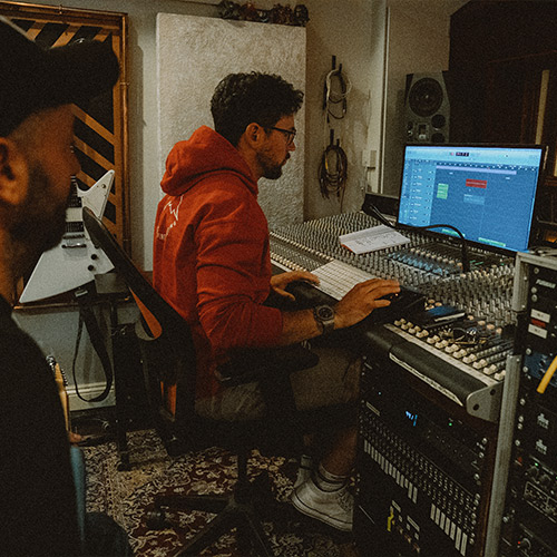 Lee collaborating at desk