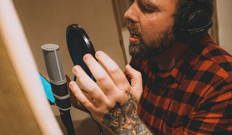 Closeup of singer in the booth