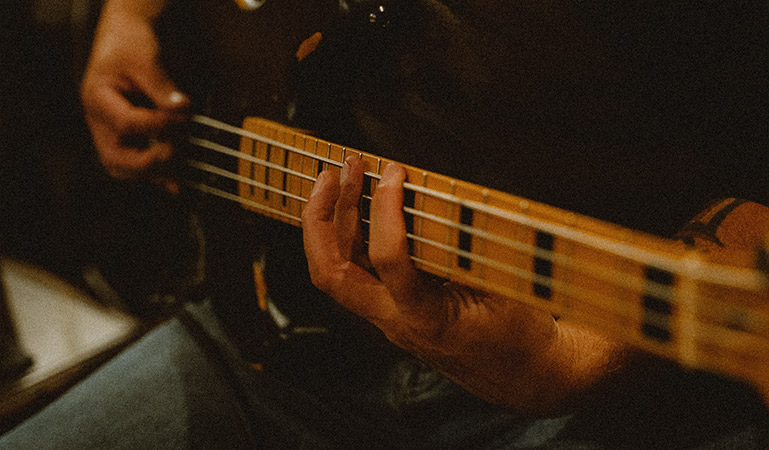Guitarist closeup playing