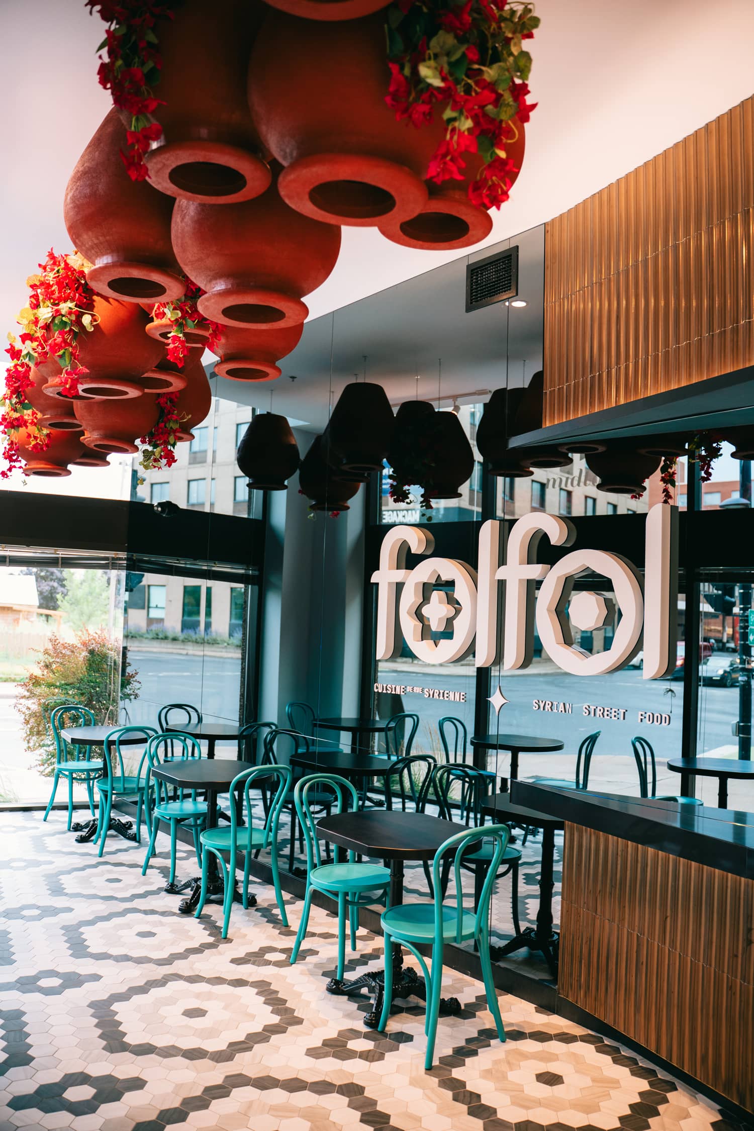 Bright and inviting dining area in Folfol restaurant, designed by Atelier MIM