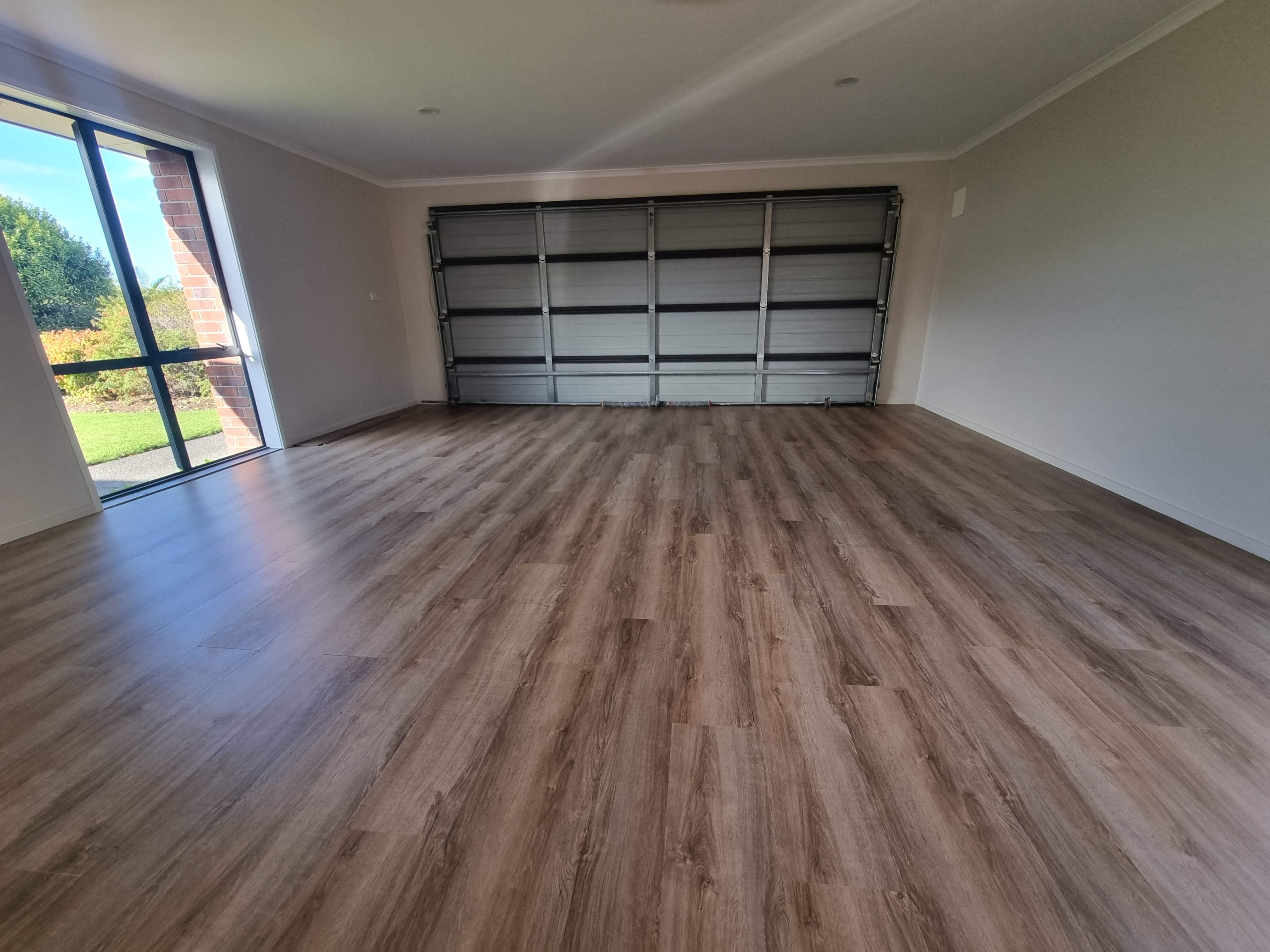 Hard flooring installed in a living room