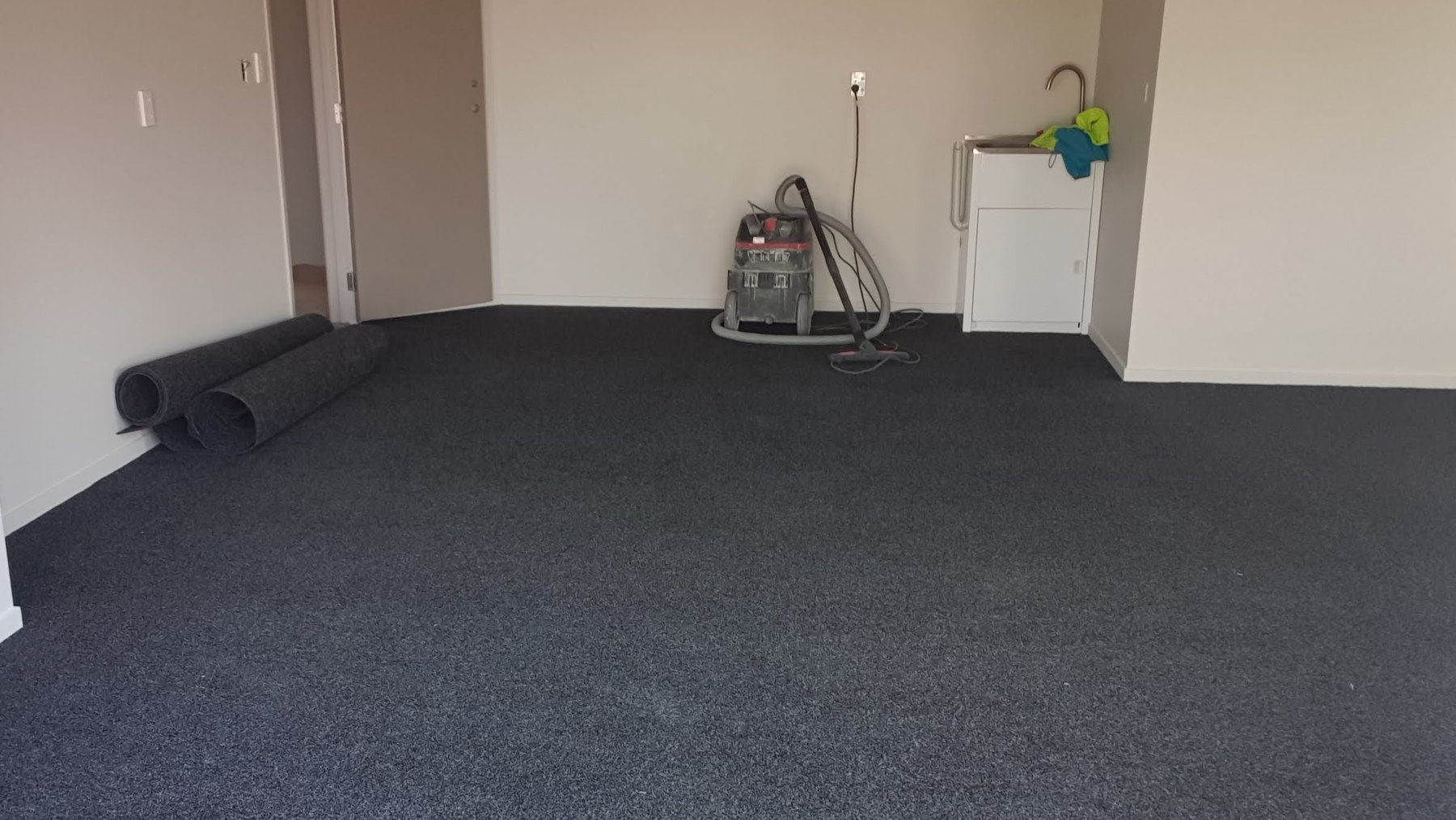 Double garage with new charcoal garage carpet installed, Tauranga