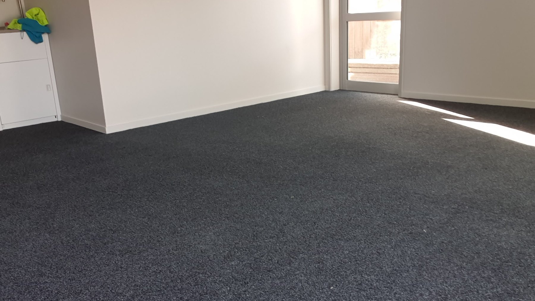Charcoal garage carpet laid in a double garage in Tauranga