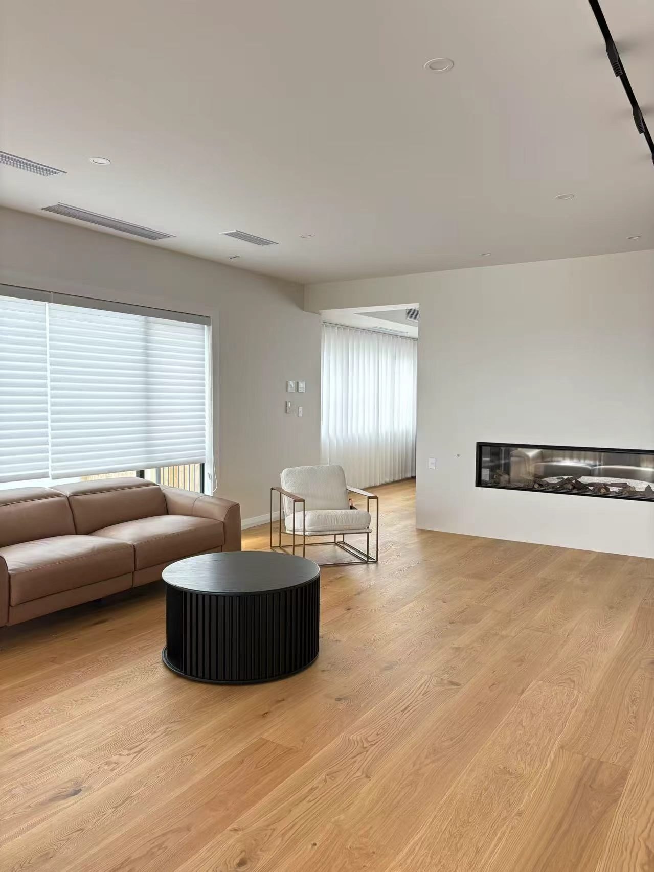 Natural oak engineered timber flooring in an open living room, laid by Floorical in the Bay of Plenty