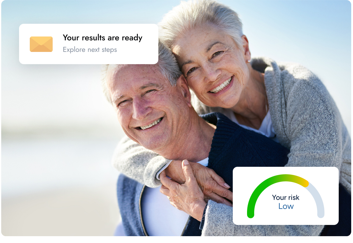 Elderly couple embracing on a beach
